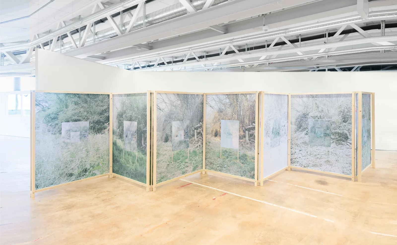 Installative work, wooden room divider and textile prints, 500 cm x 170 cm